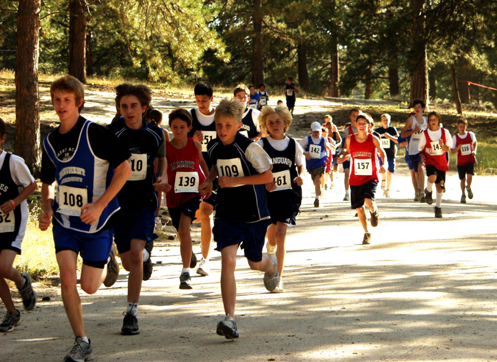 Middle school boys running club trail
